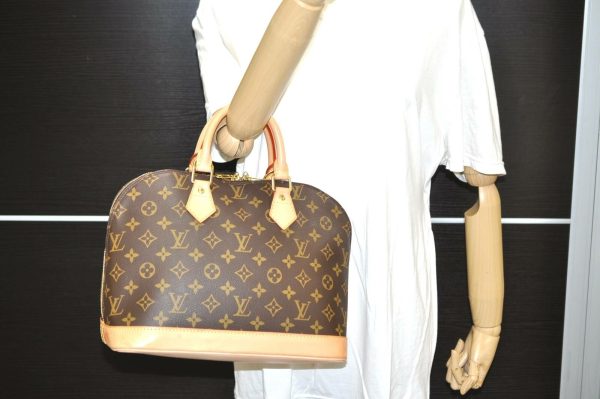 12 Louis Vuitton Monogram Alma Hand Bag