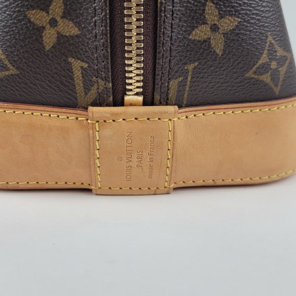 4 Louis Vuitton Alma Brown Monogram Coated Canvas Zipped Handbag