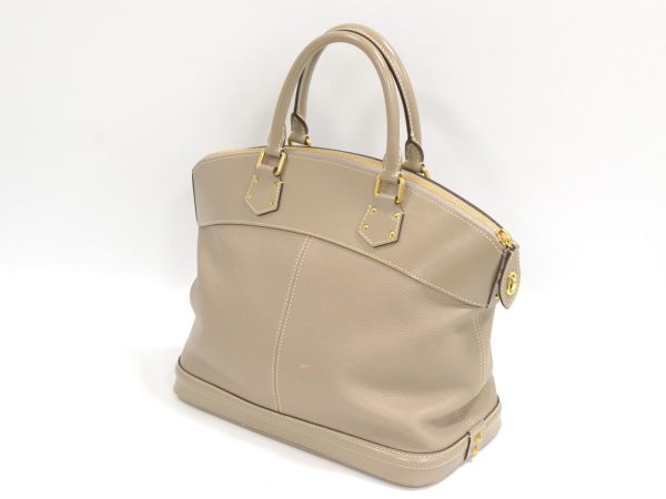 s l1600 1 Louis Vuitton Lockit MM Suhali Leather Handbag Gray Beige