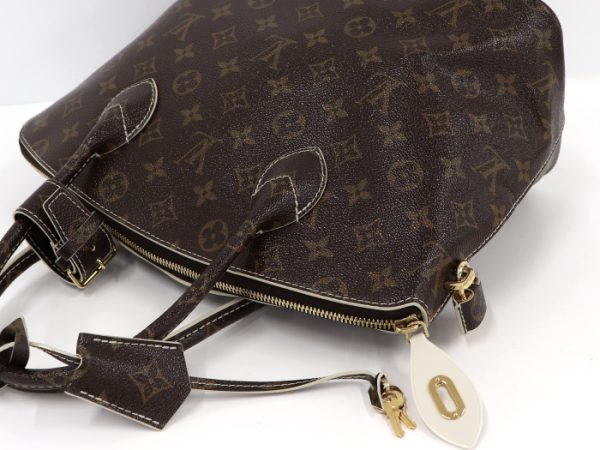 3 Louis Vuitton Lockit Shiny Monogram Handbag