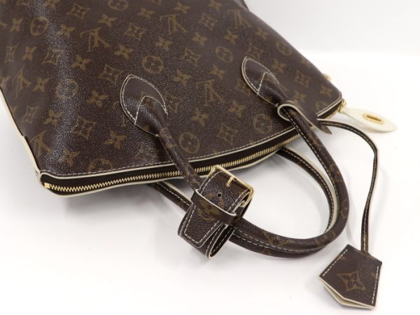 4 Louis Vuitton Lockit Shiny Monogram Handbag