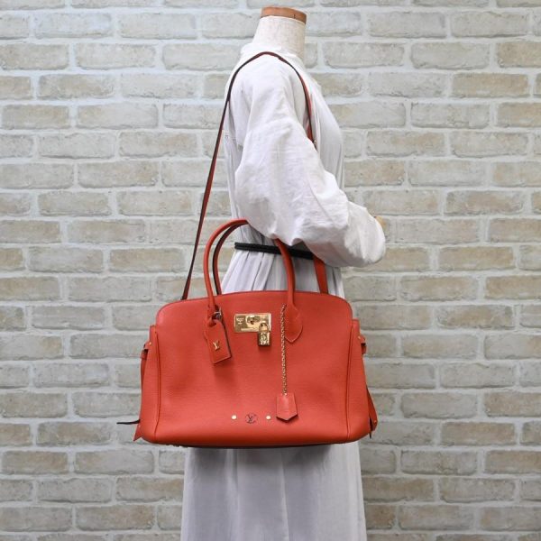 6 Louis Vuitton Mira MM Handbag Kataoshi Leather Orange