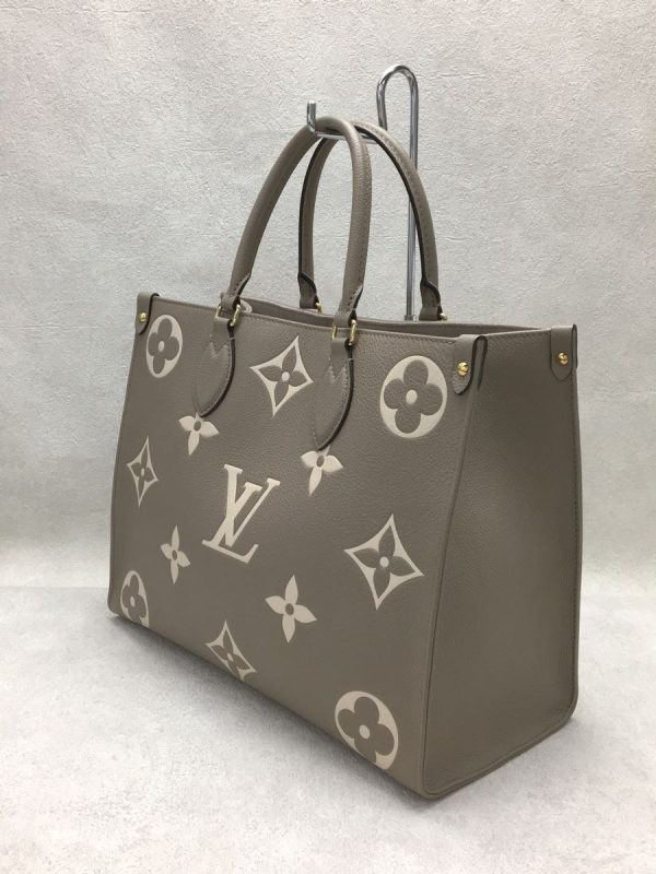 2 Louis Vuitton On The Go MM Monogram Emplant Gry Leather