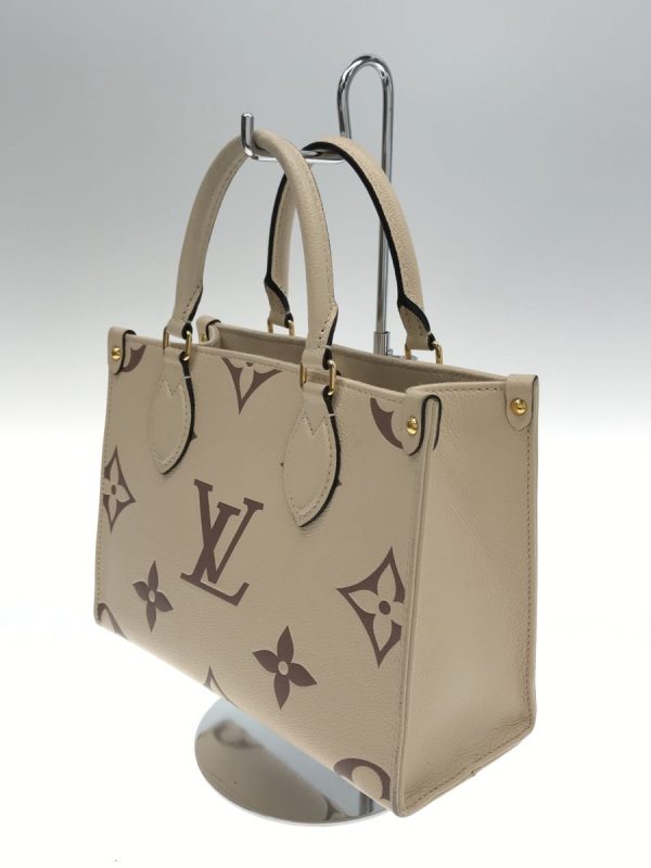 2333920402066 02 Louis Vuitton OnTheGo MM Empreinte Leather Beige