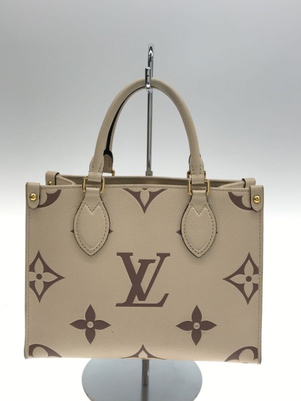 2333920402066 04 Louis Vuitton OnTheGo MM Empreinte Leather Beige