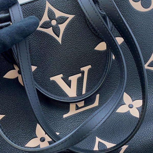 8736161 09 Louis Vuitton Monogram Implant On The Go MM Shoulder Bag