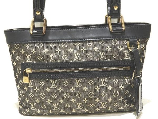 imgrc0092197987 Louis Vuitton Lucile Monogram Mini Canvas Leather Handbag