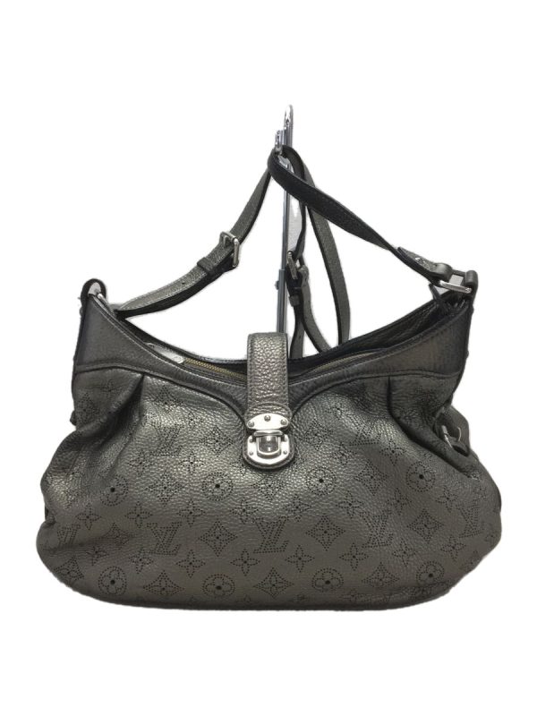 1 Louis Vuitton Leather Handbag