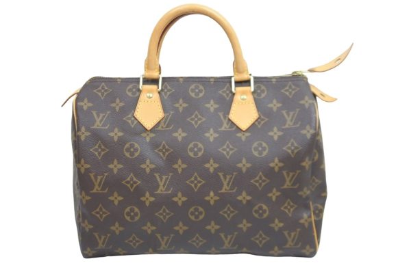 1 Louis Vuitton Speedy 30 monogram PVC leather gold