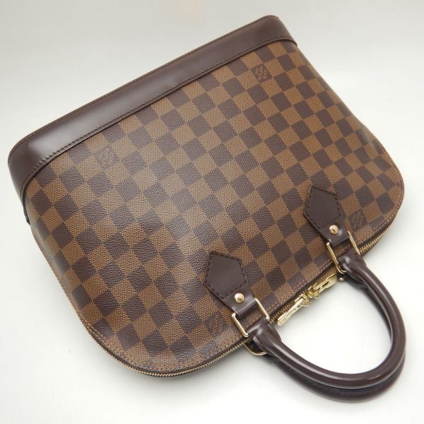 2 Louis Vuitton Damier Alma Handbag Ebene