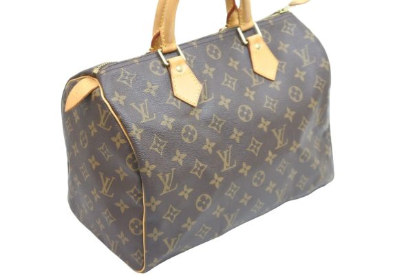 2 Louis Vuitton Speedy 30 monogram PVC leather gold