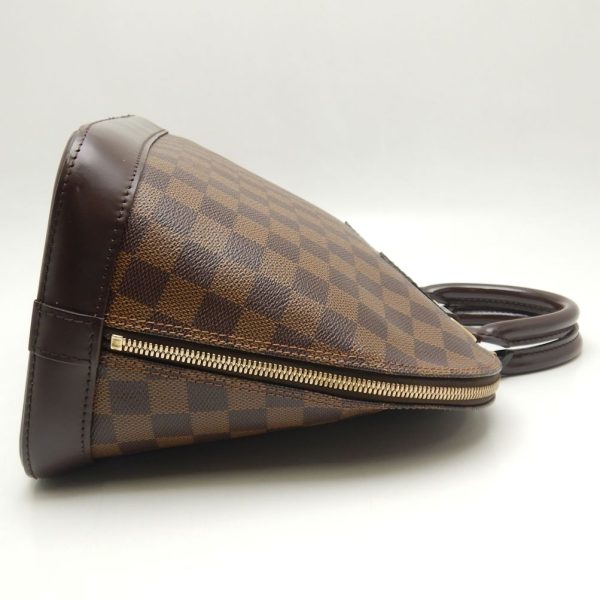 3 Louis Vuitton Damier Alma Handbag Ebene