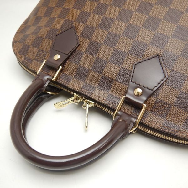 5 Louis Vuitton Damier Alma Handbag Ebene