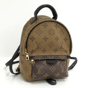 2000773259800268 1 LOUIS VUITTON Monogram PVC Porte de Cumin Voyage Brown