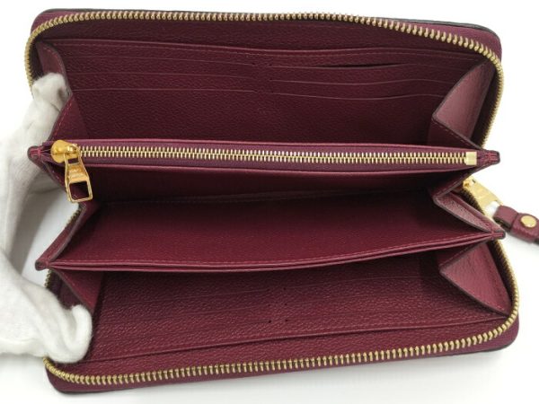 2001017257601210 2 Louis Vuitton Monogram Empreinte Raisin Round Zipper Long Wallet