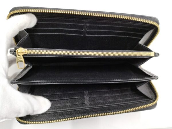 2001017257601277 2 Louis Vuitton Monogram Emplant Round Zipper Long Wallet