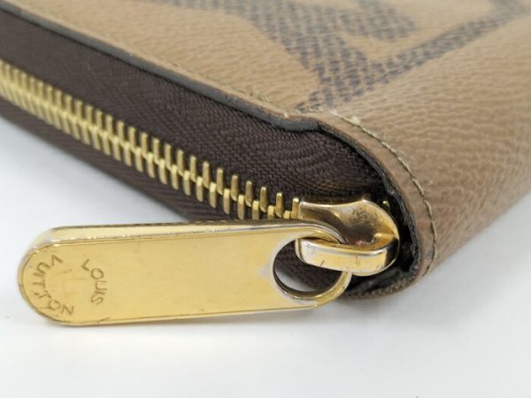 2001017257701460 5 Louis Vuitton Monogram Giant Reverse Round Zipper Long Wallet