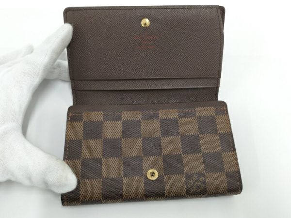 2001017259400466 2 Louis Vuitton Portefeuille Tresor Bi fold Wallet