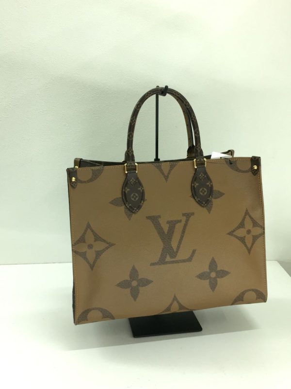 2318870953943 03 Louis Vuitton On The Go GM Monogram Handbag