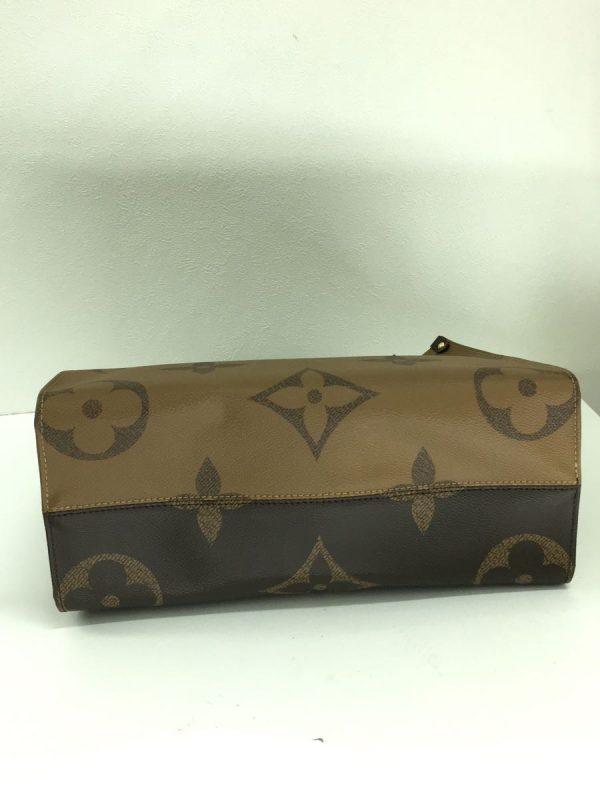 2318870953943 04 Louis Vuitton On The Go GM Monogram Handbag