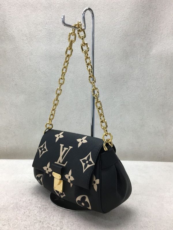 2327831013510 02 Louis Vuitton Favorite NM Cowhide Overall Pattern Handbag