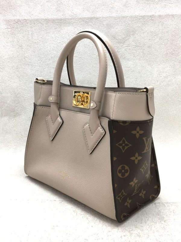 2331031167836 02 Louis Vuitton On My Side PM Monogram Leather Handbag