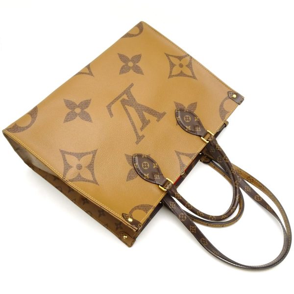 3 Louis Vuitton Monogram Giant Reverse On The Go MM Brown