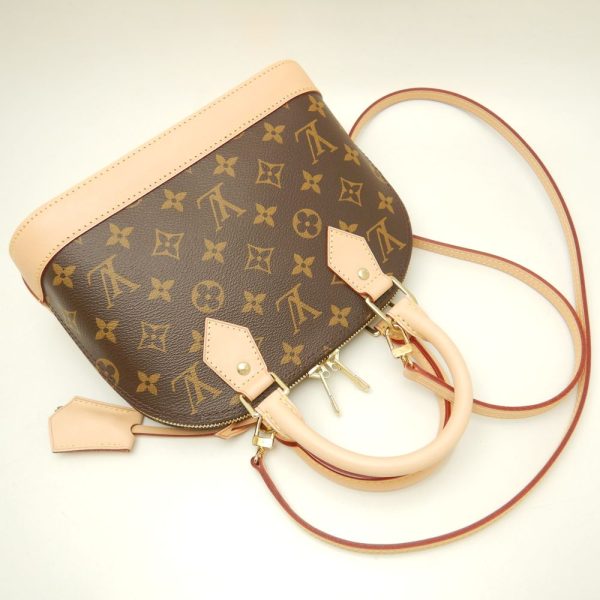 3 Louis Vuitton Monogram Alma BB Handbag Brown