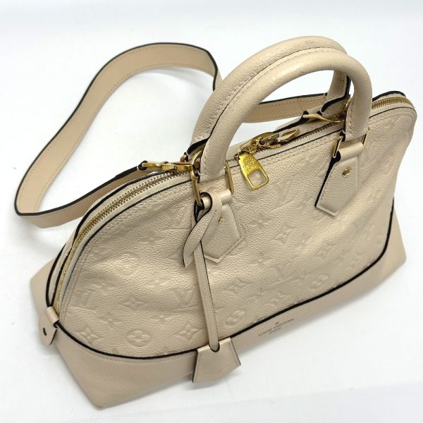 5 Louis Vuitton Monogram Implant Neo Alma PM Handbag Tourtrell Creme