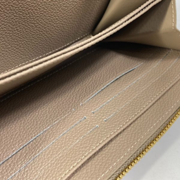 5 Louis Vuitton Monogram Implant Zippy Wallet Tourtrell Creme Beige