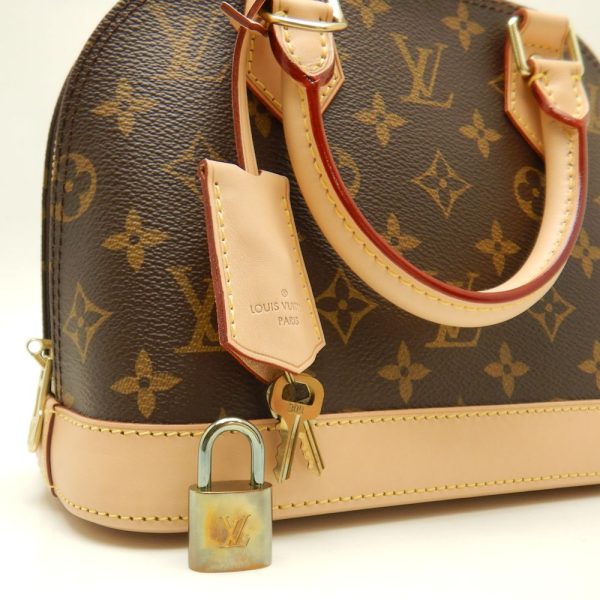 6 Louis Vuitton Monogram Alma BB Handbag Brown