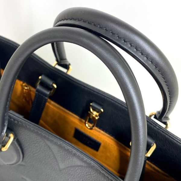 6 Louis Vuitton Monogram MM Tote Bag