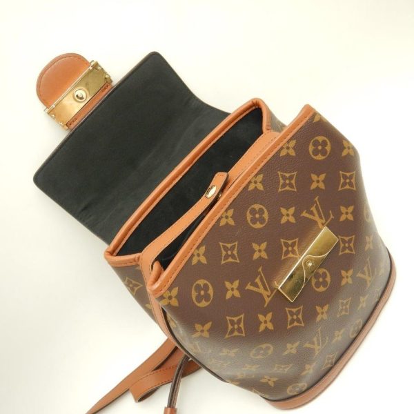 7 Louis Vuitton Monogram Reverse Dauphine Backpack Brown