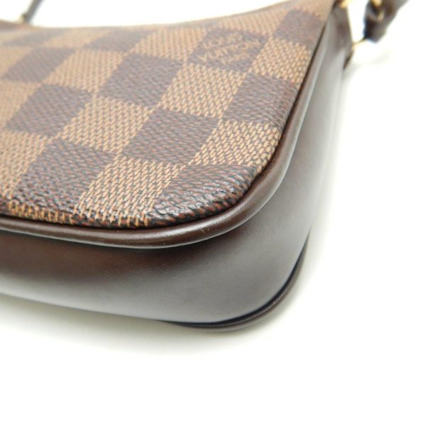 7 Louis Vuitton Damier Navona Ebene Accessory Pouch Brown