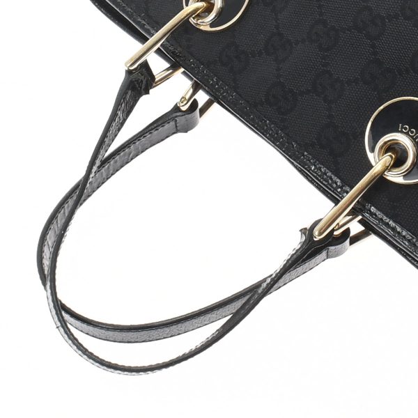 ik 00 0498536 3 Gucci Mini Black Gold Hardware GG Canvas Handbag