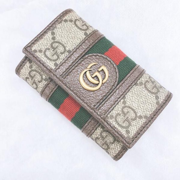 imgrc0101073630 Gucci Stripe Canvas Leather Wallet