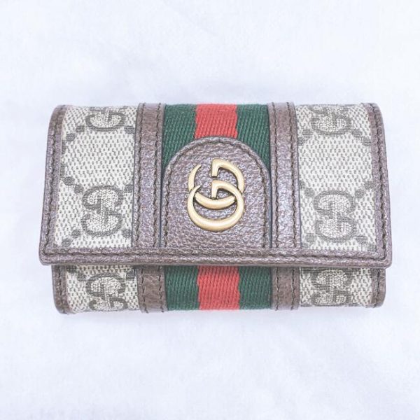 imgrc0101073631 Gucci Stripe Canvas Leather Wallet