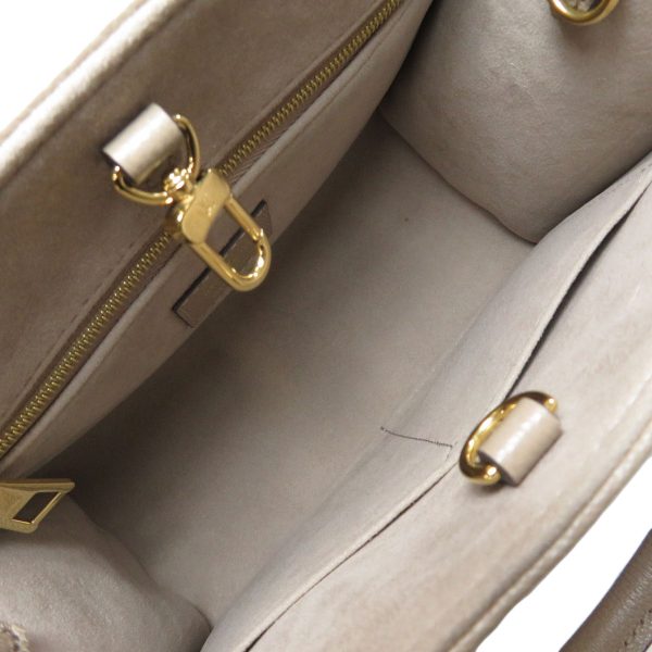 5 Louis Vuitton On the Go PM Bicolor Tourtrail Crème Handbag Empreinte