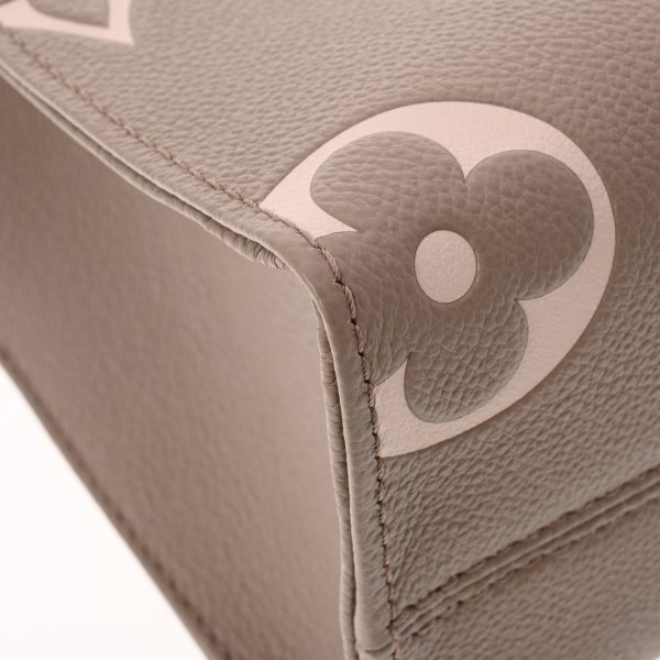 8 Monogram Empreinte On the Go PM Bicolor Tourtrail Crème Leather Handbag