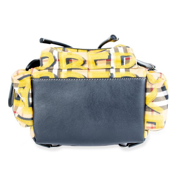 105502 ad1 037b1b2a a4b5 4ec3 b158 a27c46e6251f Burberry Yellow Check Print Graffiti Small Rucksack