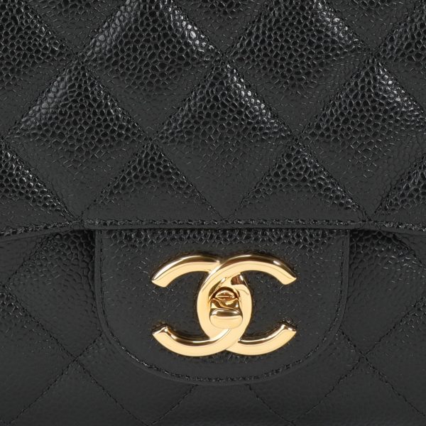 106444 ad1 Chanel Black Caviar Quilted Classic Maxi Double Flap Bag