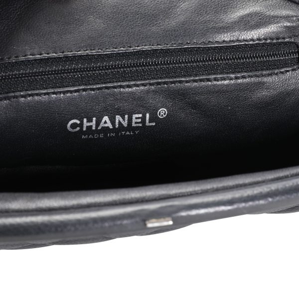 110117 ad2 Chanel Black Caviar Quilted Timeless Clutch