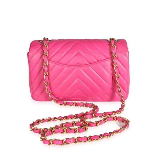 118410 pv d7180701 06ed 4ea4 8ac9 02d24562b405 Chanel Hot Pink Chevron Quilted Lambskin Mini Rectangular Flap Bag