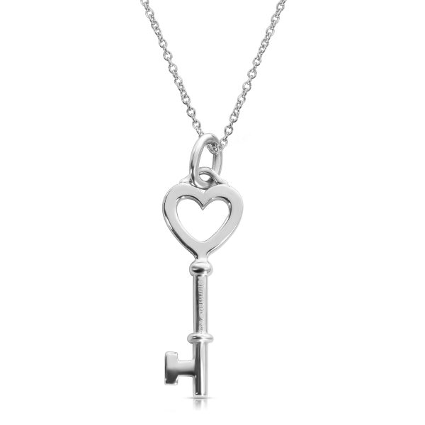 086729 bv f4016aae 045f 44b8 acb7 898517834f22 Tiffany Co Heart Key Charm in 18KT White Gold 005 ctw