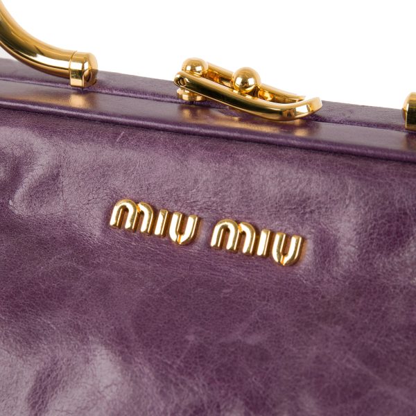 105552 clasp 8c10ea8b b4fc 4747 977c bb57b477be97 Miu Miu Purple Distressed Leather Frame Bag