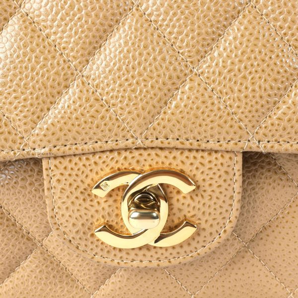 106452 ad1 0c65e049 18f7 4aaa 944d b444ac6ea385 Chanel Tan Caviar Quilted Classic Medium Double Flap Bag