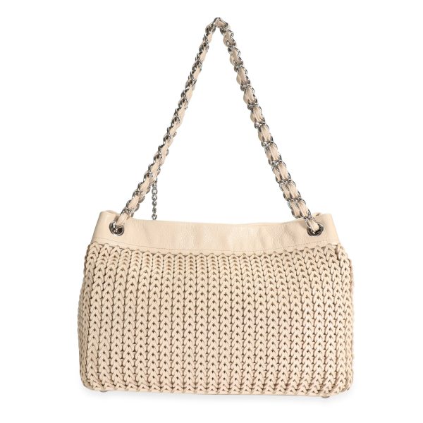 106666 pv Chanel Pale Pink Woven Leather Charm Tote