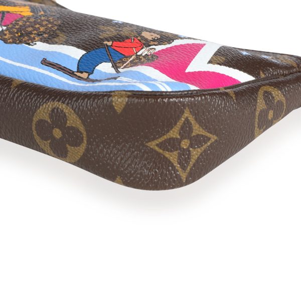 111007 clasp 8f972e68 6796 4a5c 8f24 3690b9e6a7bf Louis Vuitton Monogram Canvas Bears on Skis Mini Pochette Accessoires