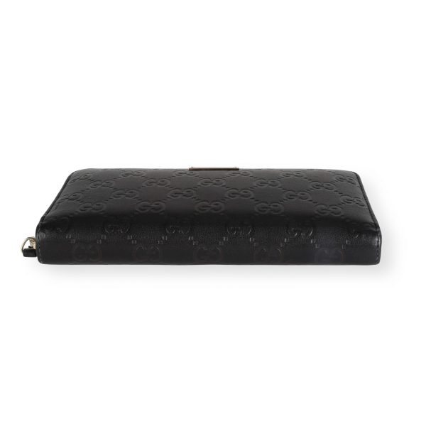 111776 stamp a2d1e38d 2cac 4aee add2 9a2760f4da04 Gucci Black Guccissima Leather Zip Around Wallet