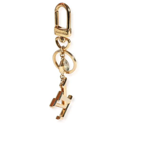 113582 sv Louis Vuitton Gold Facettes Bag Charm Key Holder